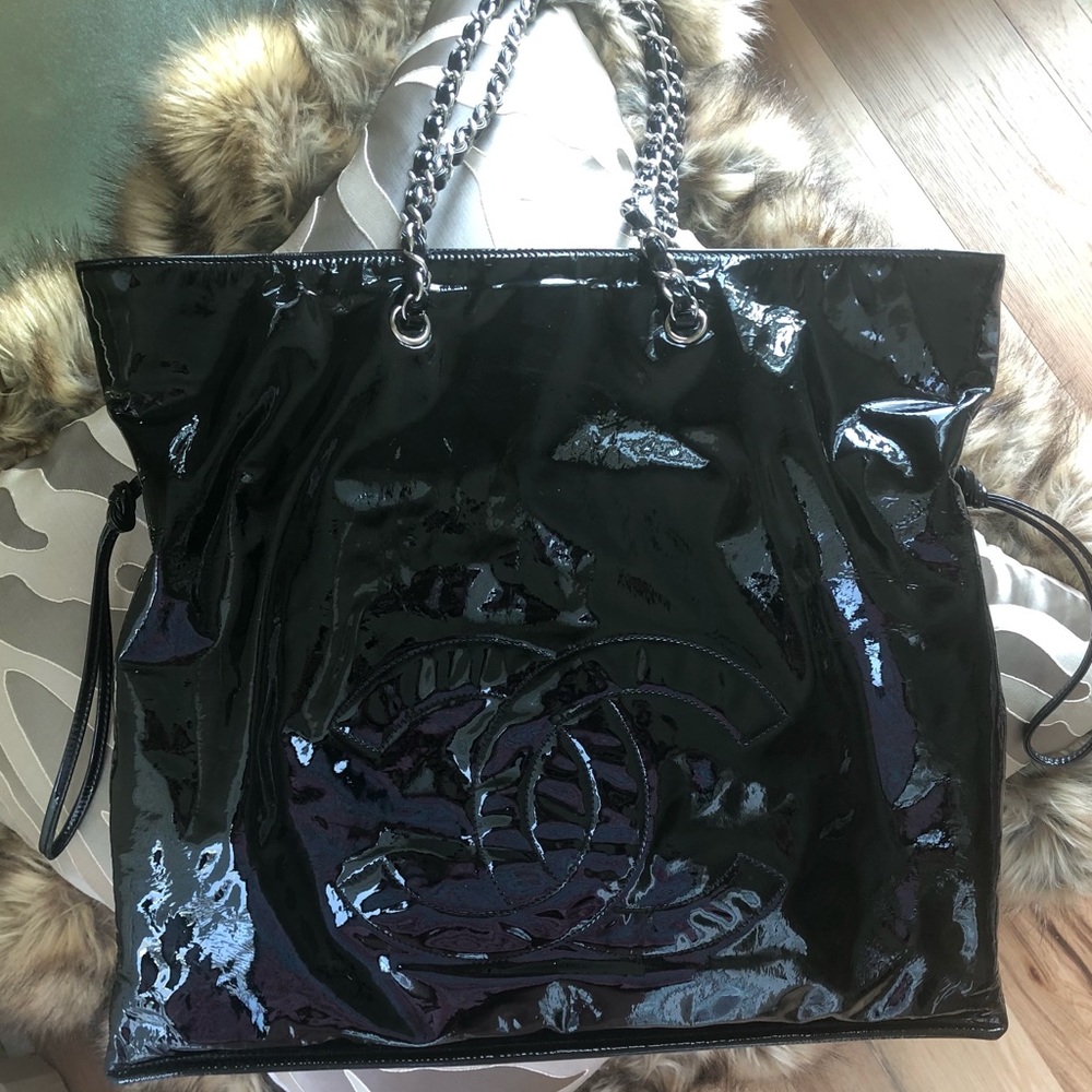 Chanel black patent handbag.